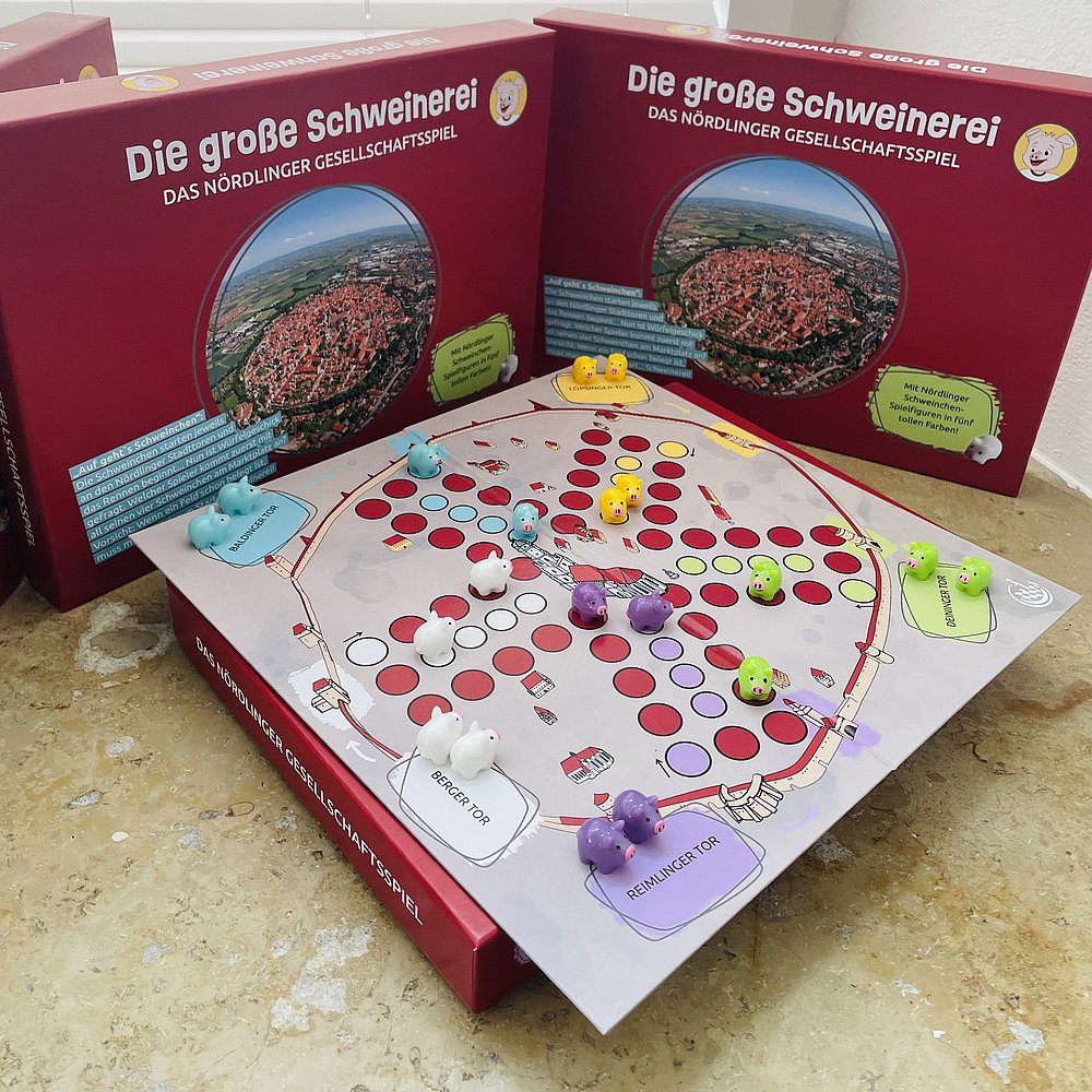 Das bunte Schweinchen-Spiel der Stadt Nördlingen