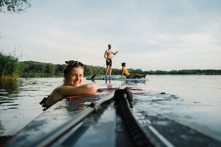 SUP fahren am Oberrieder Weiher SUP fahren am Oberrieder Weiher